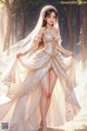 A woman in a wedding dress standing in the woods.